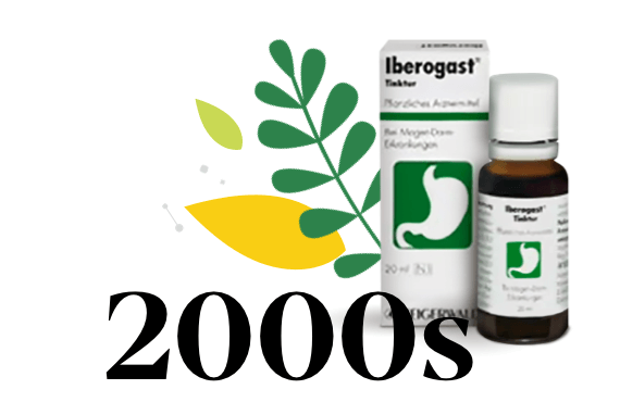 Date 2000s surrounded by leaves, white and green bottle of Iberogast with its matching packaging next to it.